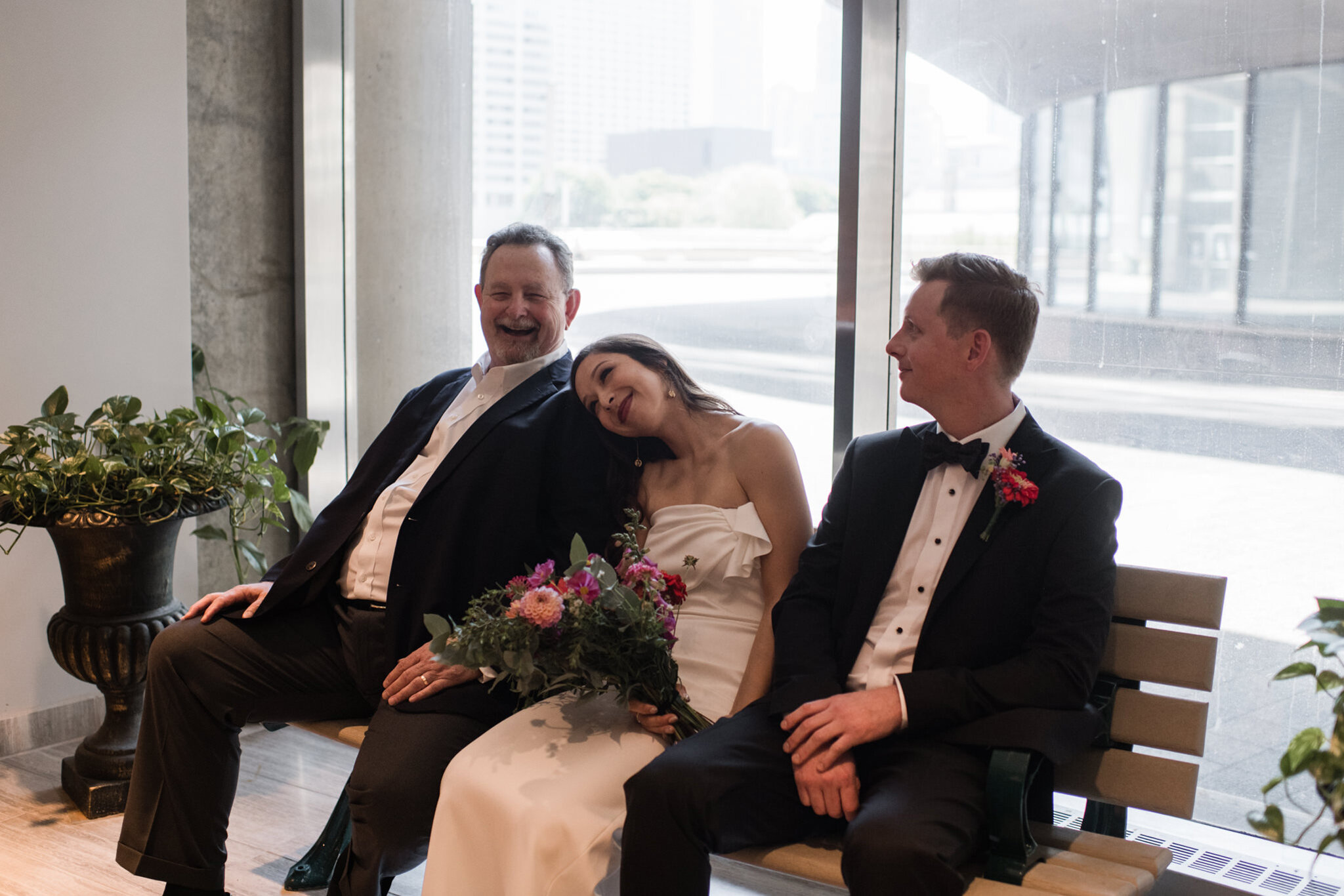 426-cute-moment-city-hall-toronto-elopement-bride-groom-father-in-law.jpg
