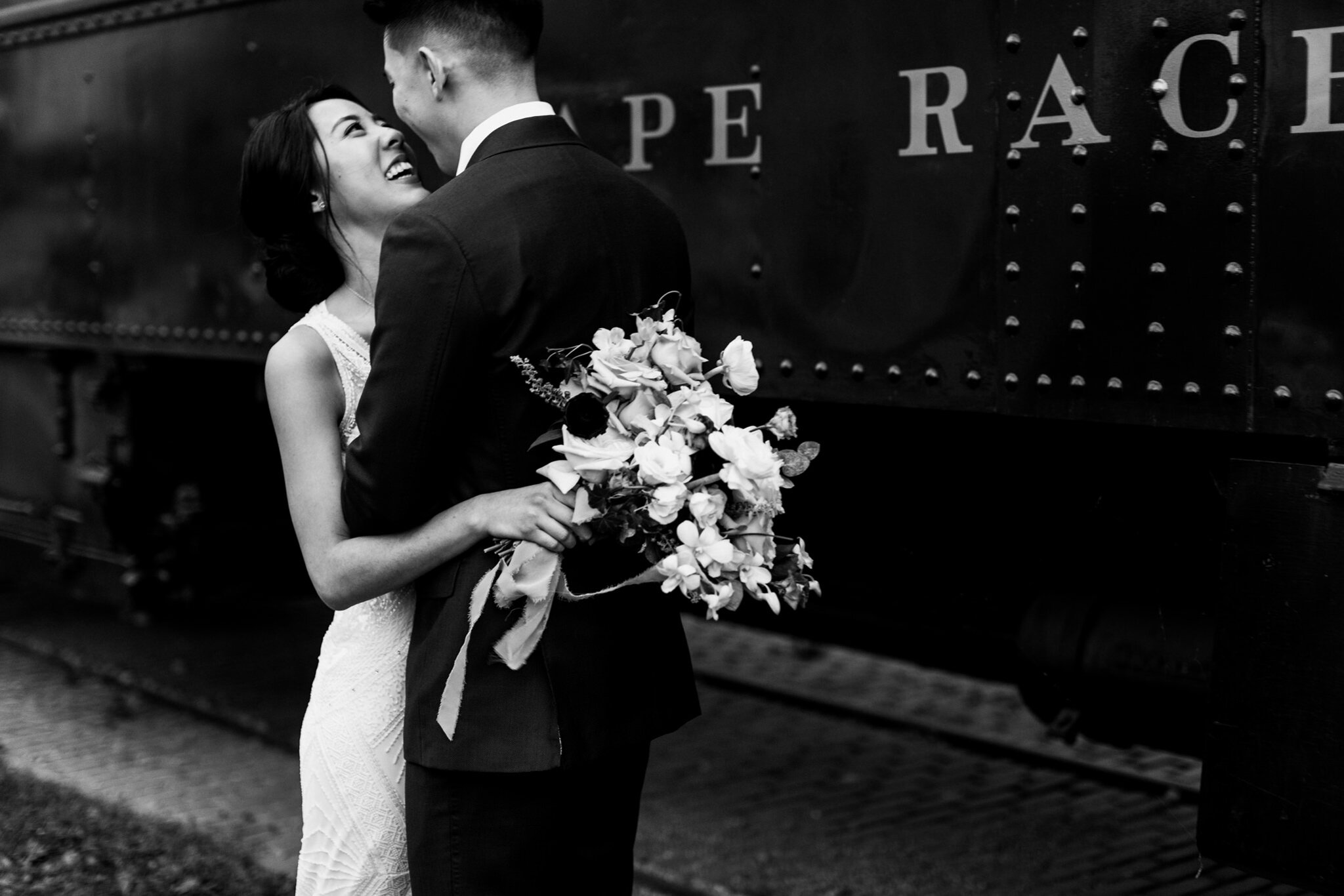 146-bride-groom-wedding-couple-photos-steamwhistle-downtown-toronto-reception-string-lights.jpg