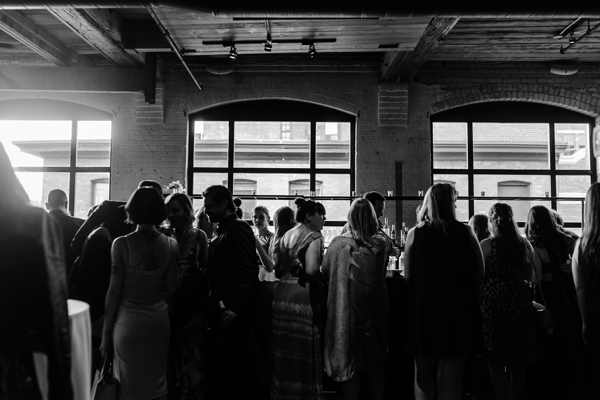 086-cocktail-hour-candid-toronto-industrial-building.jpg