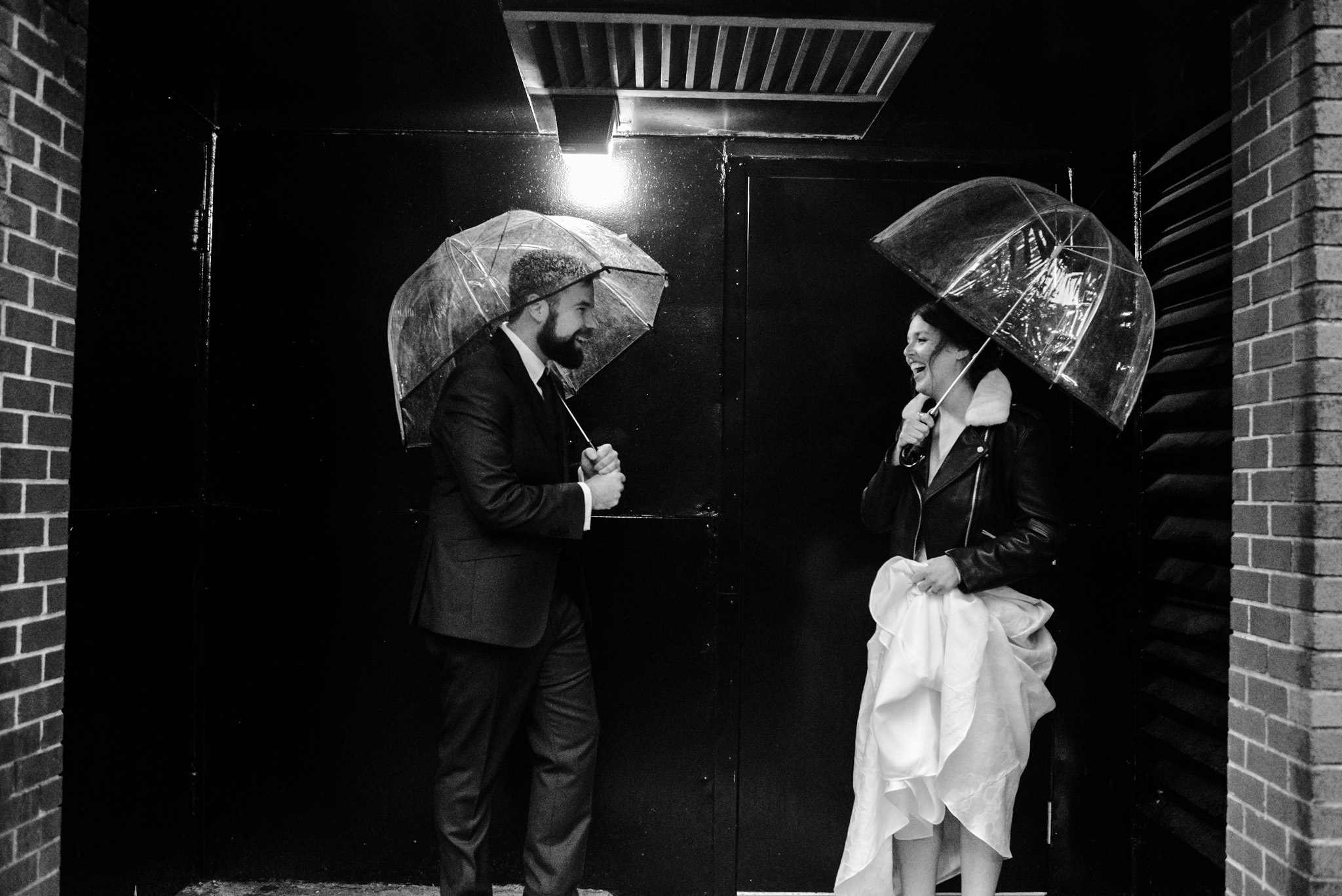 127-rainy-day-wedding-toronto-wedding-photographer-clear-umbrellas.jpg
