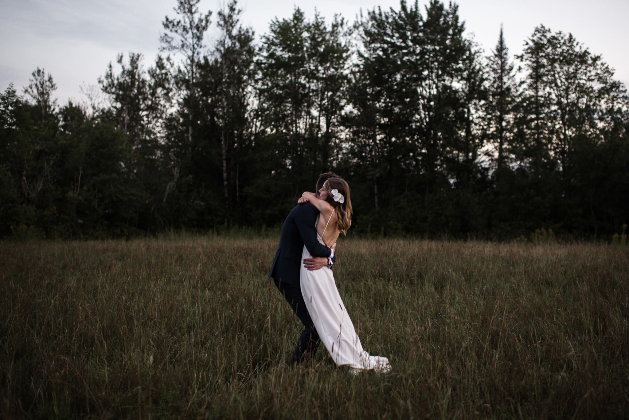 085-bride-groom-wedding-photos-in-field-at-sunset-toronto-romantic-black-white.jpg