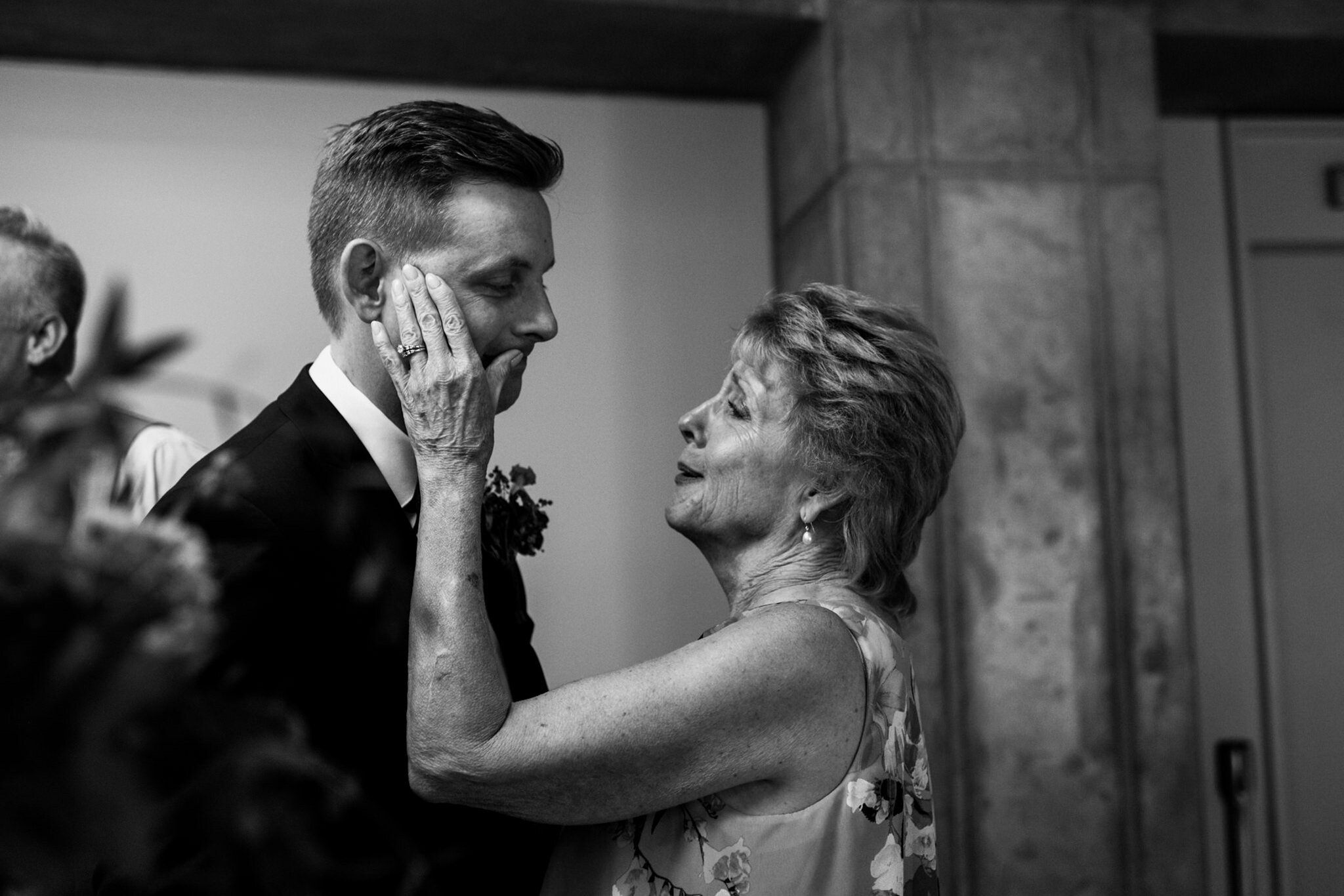 427-mother-groom-emotional-moment-toronto-city-hall-wedding.jpg