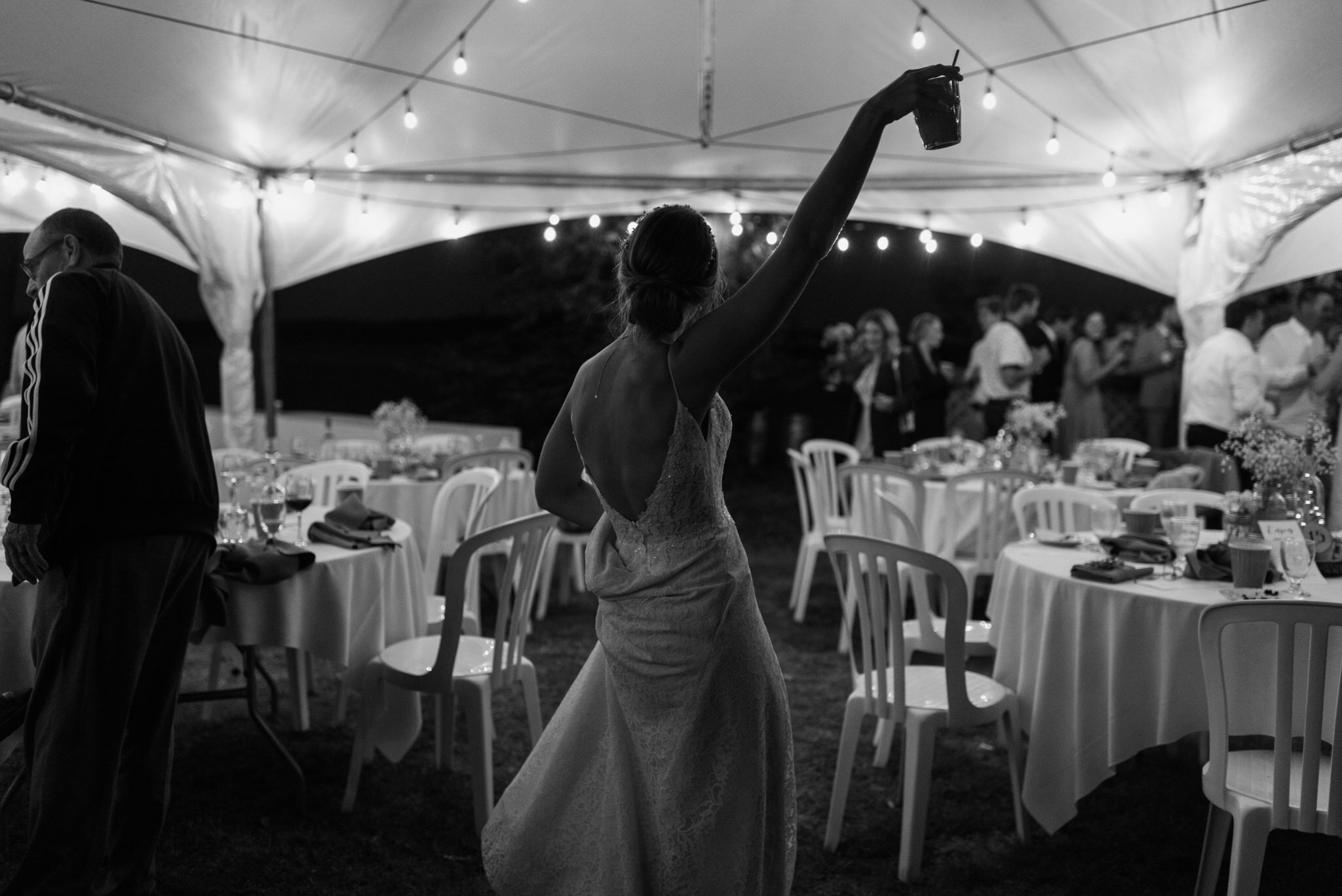 548-bride-groom-dancing-reception-wedding-tent-ontario-cottage-toronto.jpg