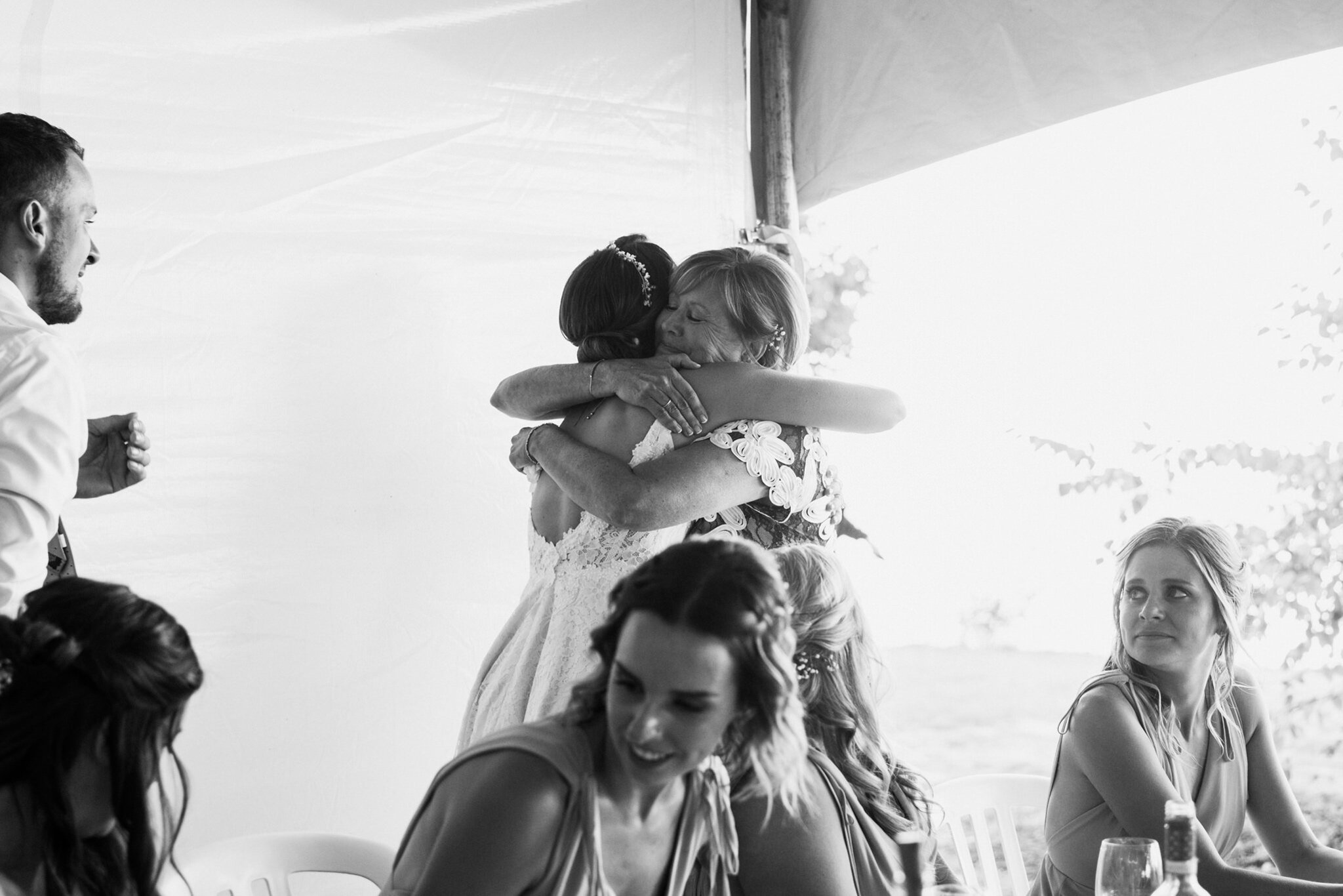 576-mom-daughter-speech-reaction-emotional-black-white-tent-reception-wedding.jpg