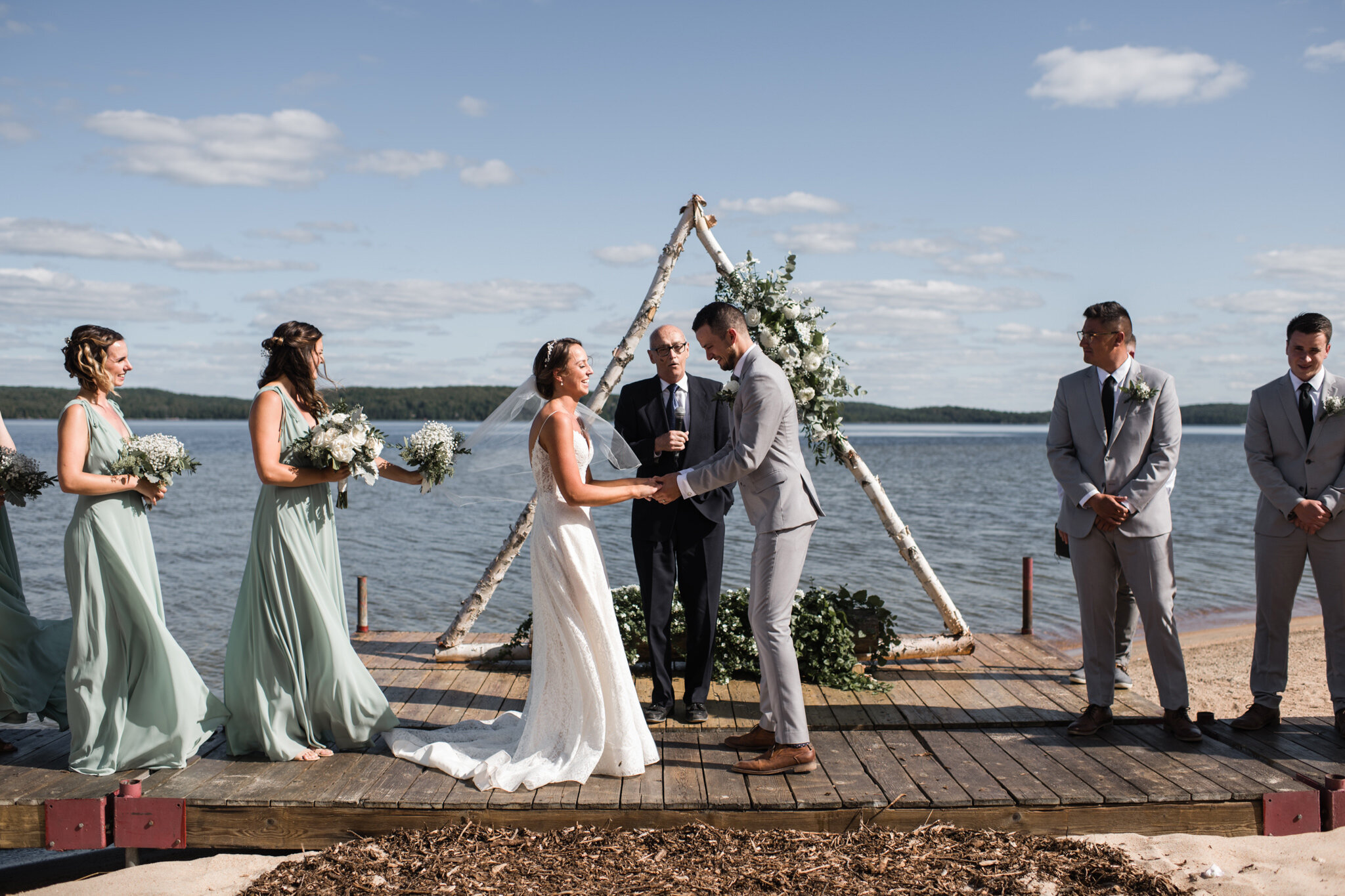 602-outdoor-wedding-ceremony-by-the-lake-sundridge.jpg