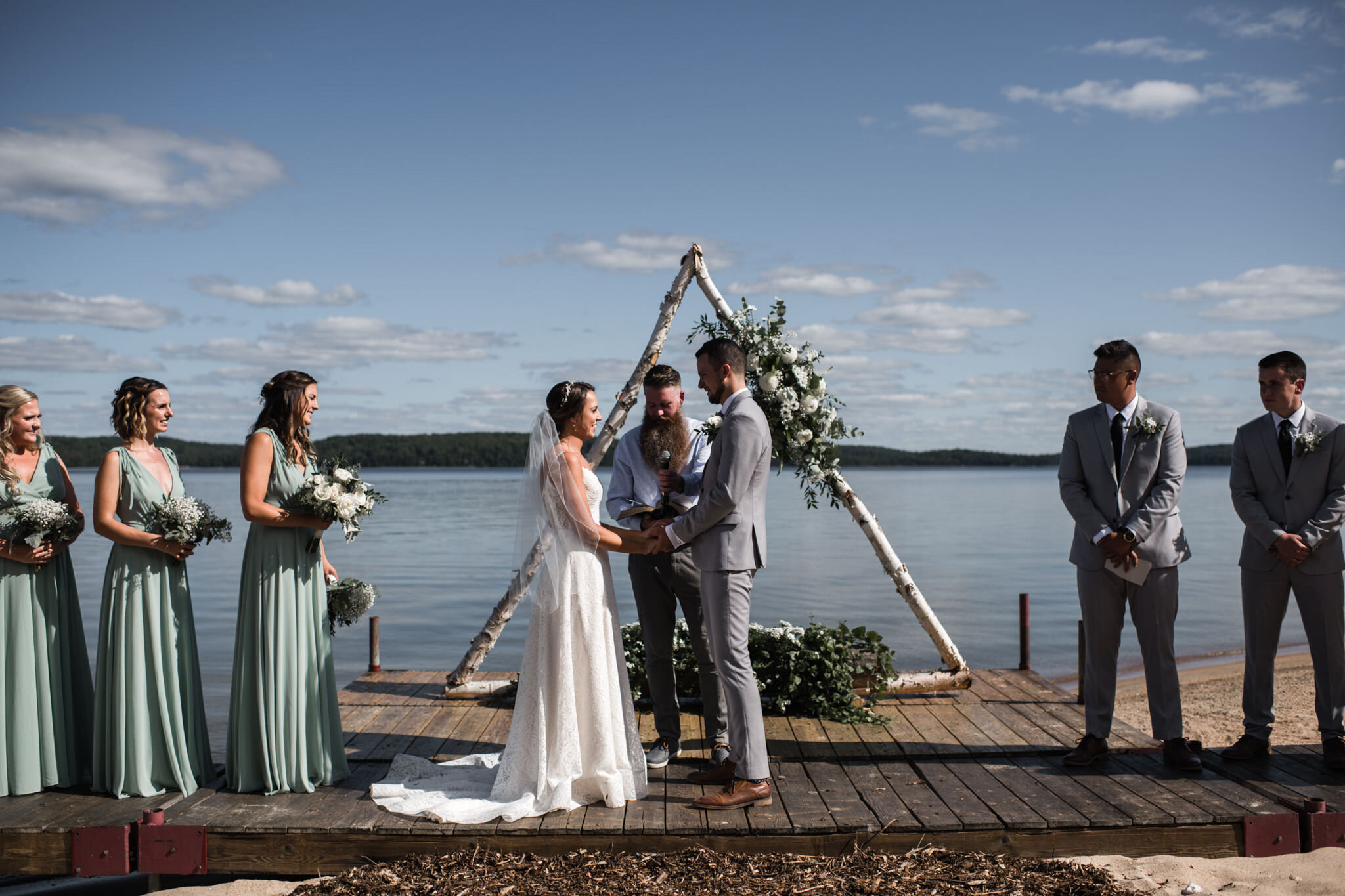 610-outdoor-wedding-ceremony-by-the-lake-sundridge.jpg