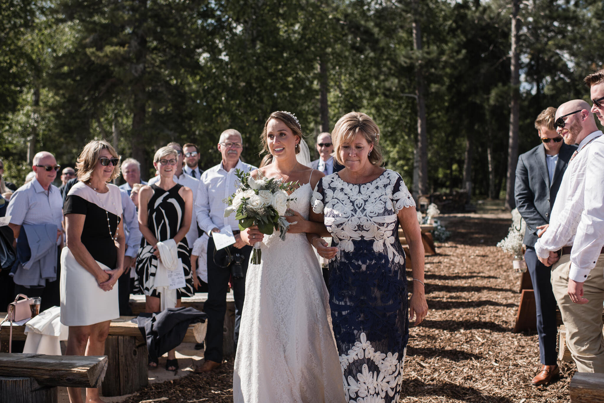 622-mother-walking-bride-down-aisle-wedding-outdoor-ceremony-cottage-ontario-toronto.jpg