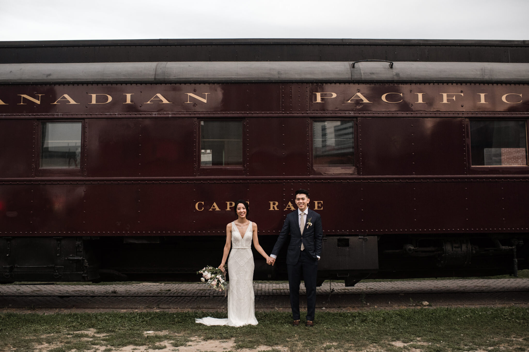147-steamwhistle-train-photos-brewery-toronto-downtown-wedding-bride-groom-couple.jpg
